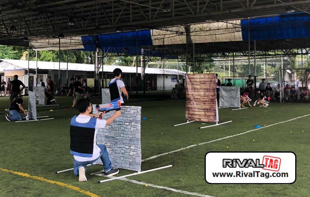 We setup multiple walls in the field for players to take cover. | RIVAL TAG Singapore Team Building